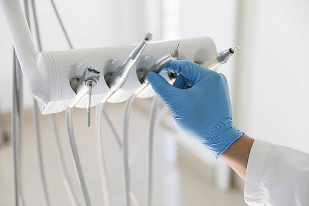 Professional Tooth Extraction technician working in Candor, NC